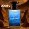 A perfume bottle of named Ocean Heart placed while the background represents rocks and mountains giving an urban desert vibe.